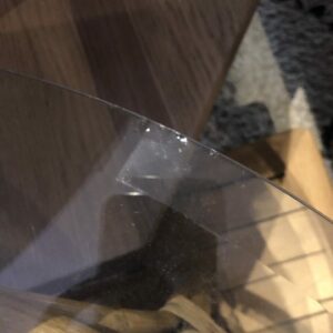 Table basse en rotin et verre